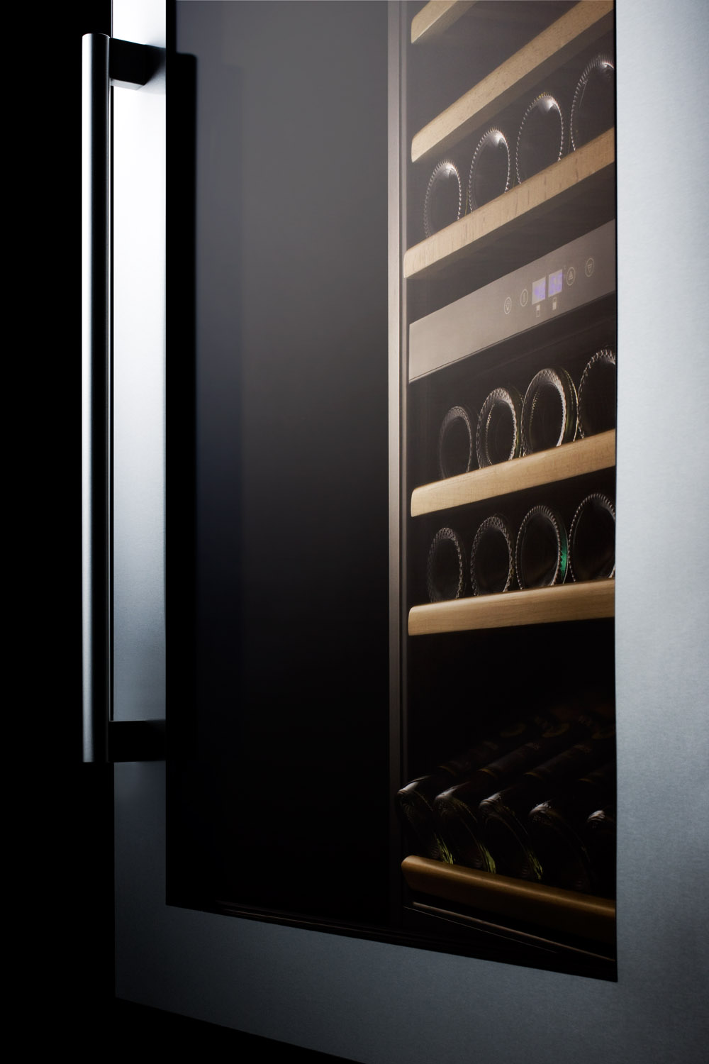 51 bottle fully integrated dual zone commercial wine cellar designed for the display and refrigeration of beverages, with digital controls and LED lighting